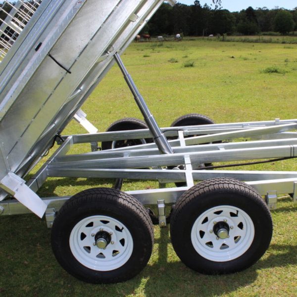 Trailer in tipping position | Featured Image for the Hydraulic 10x 6 Galvanised Tipping Trailer Product Page of Machinery Direct.