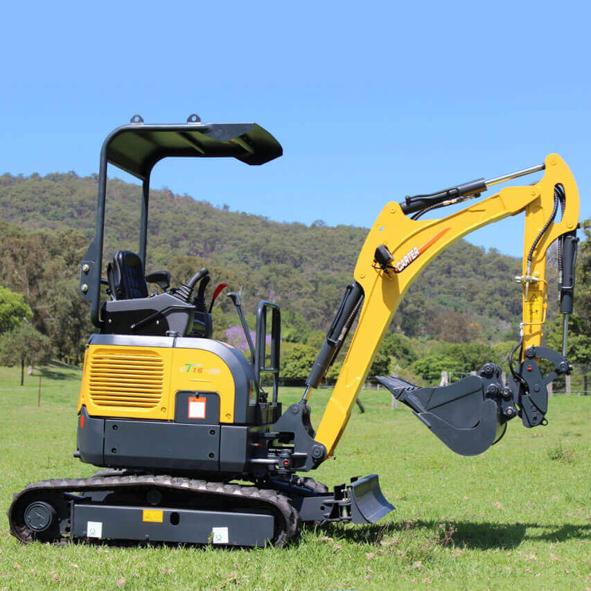 Carter CT16 mini excavator standing idle on a job site | Featured Image for the Yanmar Powered Carter CT16 Mini Excavator Product Page of Machinery Direct.